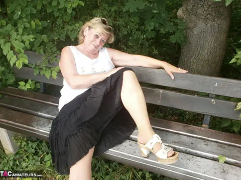Thick MILF in Stockings Fingers Her Hairy Pussy on the Forest Bench – photo 4 of 20