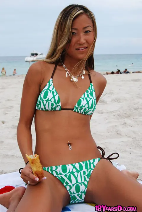 Kara Tai: Asian Babe in a Bikini and Glasses Poses on the Beach – photo 9 of 16