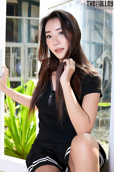 Asian Brunette with Big Tits and Piercing Shows Off in a Skirt – photo 5 of 16