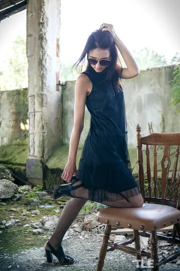 European Brunette in Stockings Masturbates with a Dildo