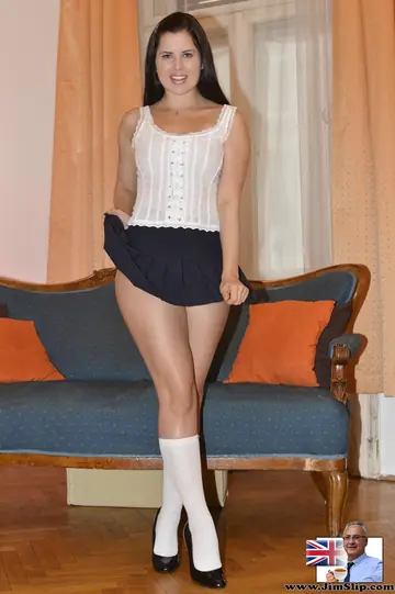 Thick Russian Brunette in Stockings Lifts Her Skirt to Show Panties