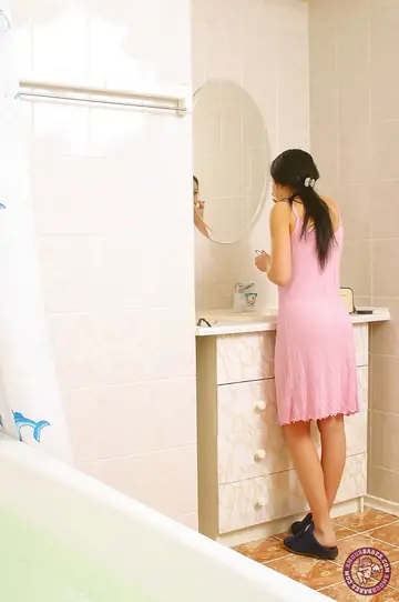 European MILF Strips Off Her Skirt and Spreads in the Bathroom
