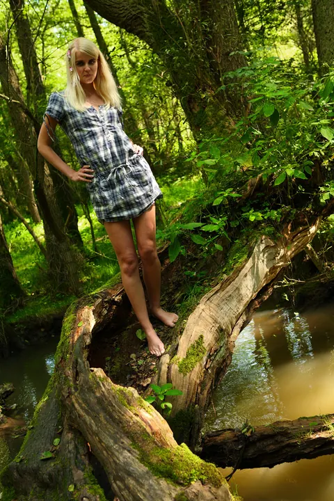 Blonde Masturbates in Her Skirt on a Tree Limb Outdoors – photo 5 of 20