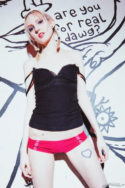 Lacey Lust: Busty Blonde Fingers Her Shaved Pussy by a Graffiti Wall – photo 6 of 17