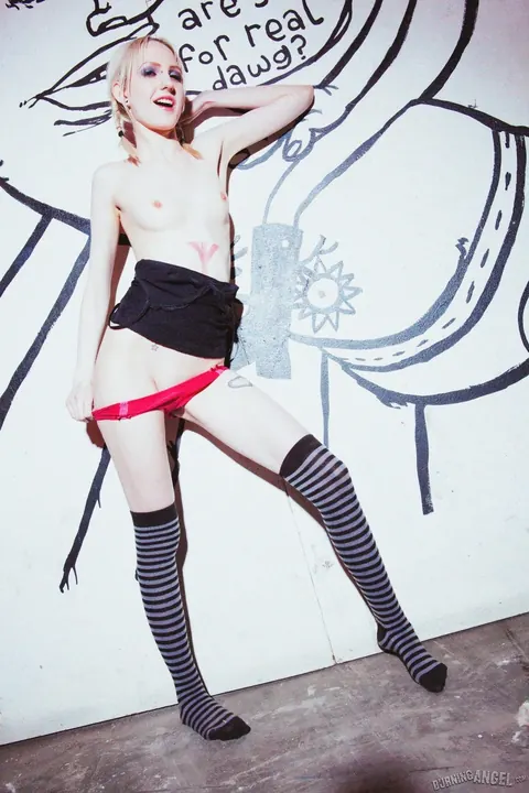 Lacey Lust: Busty Blonde Fingers Her Shaved Pussy by a Graffiti Wall – photo 12 of 17