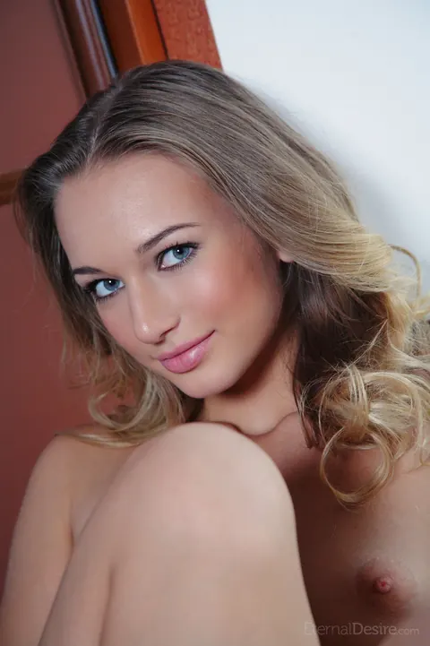 Amy Moore: Tall Blonde with Natural Tits Spreads by the Window – photo 12 of 16