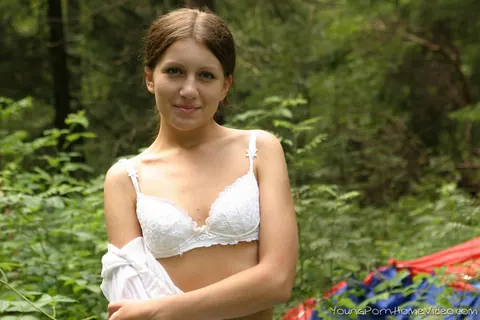 Slim Woman Strips on a Blanket in the Woods and Fingers Herself – photo 2 of 16