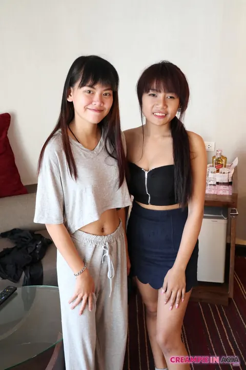 Petite Asian Brunettes in Bikinis Strip and Lick Pussy Together – photo 3 of 20