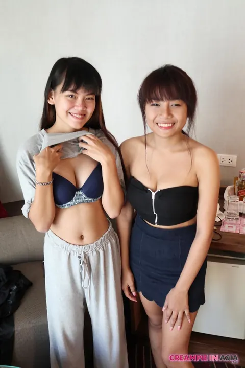 Petite Asian Brunettes in Bikinis Strip and Lick Pussy Together – photo 4 of 20