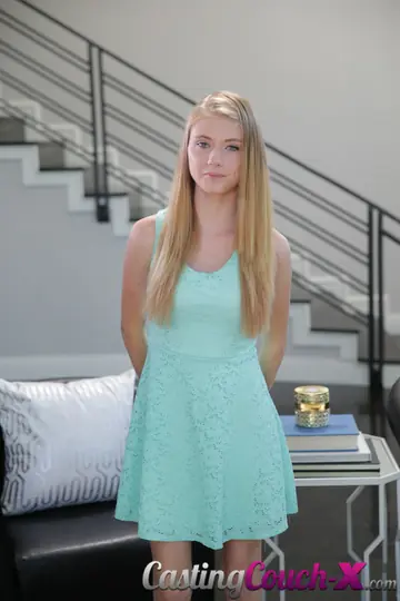 Hannah Hays – Slim Blonde Strips and Fingers Her Pussy on the Sofa