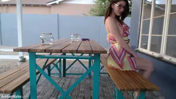 Busty Brunette in a Skirt Plays with a Dildo Outdoors