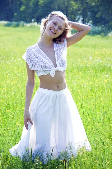 Woman Strips Out of Her Skirt and Fingers Her Pussy Outdoors