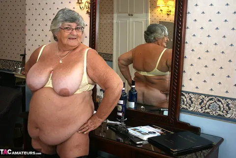 Thick British MILF in Stockings and Glasses Uses a Dildo for a Phone Selfie – photo 16 of 20
