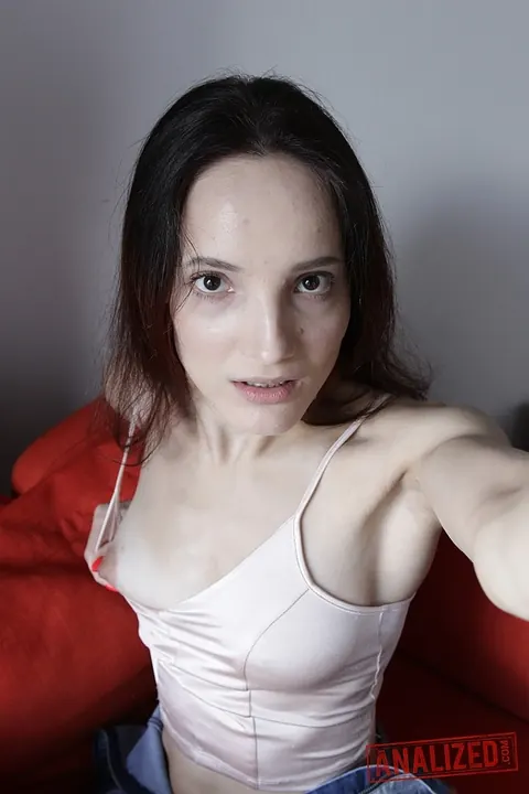 Mia Sanders: Skinny Russian Brunette Pulls Panties Aside and Spreads Her Pussy on the Sofa – photo 11 of 20