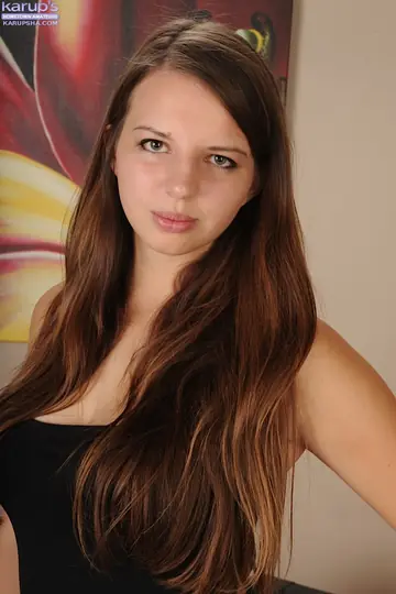 Busty Woman Strips Out of Her Skirt and Panties