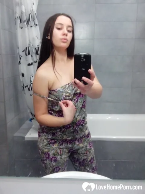 Curvy Brunette with Big Tits Strips in the Bathroom Mirror – photo 2 of 16