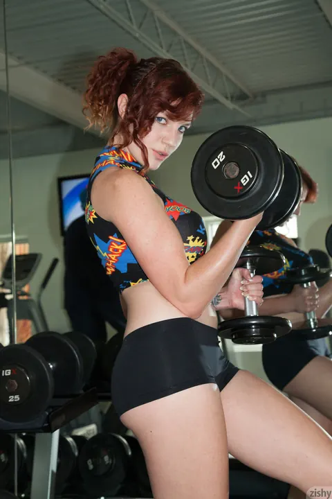 Felicia Davies: Petite Redhead in Glasses Spreads Her Ass in Shorts – photo 1 of 12