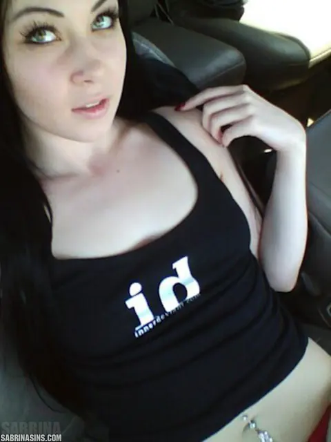 Sabrina Sins: Brunette Pulls Panties Aside and Fingers Her Pussy in the Car Back Seat – photo 13 of 16
