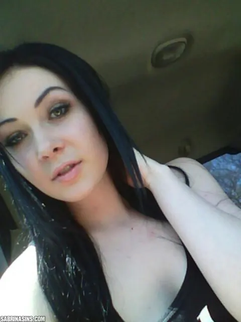 Sabrina Sins: Brunette Pulls Panties Aside and Fingers Her Pussy in the Car Back Seat – photo 3 of 16