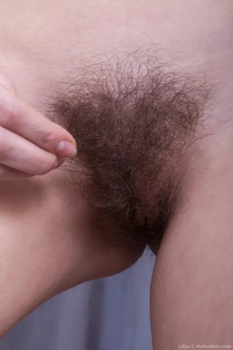 Liliya: Tall Redhead Pulls Aside Her Pantyhose to Spread Her Hairy Pussy – photo 15 of 18