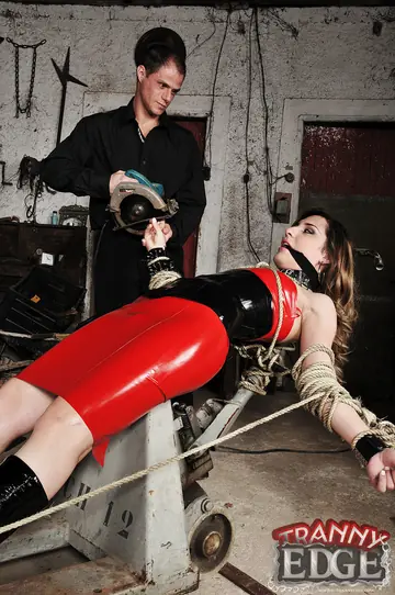 Trans Woman in Latex Submits to Bondage and Anal Sex