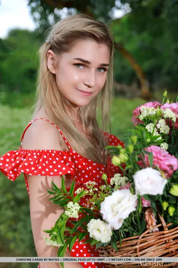 Blonde Strips Out of Her Skirt and Spreads in a Hilly Field