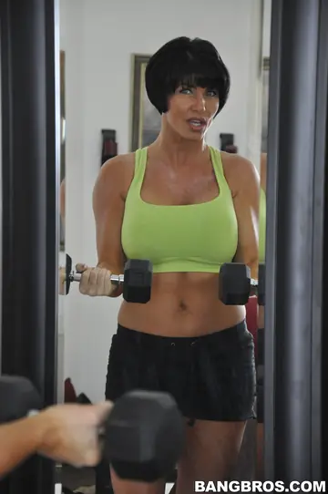 Fit Brunette MILF with Big Tits Fucks in the Gym