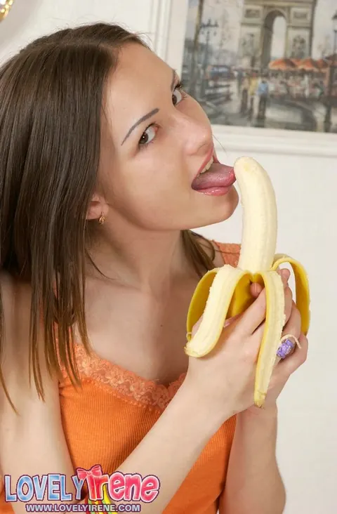 Lovely Irene: Slim Brunette Peels a Banana in Panties and Socks – photo 2 of 15
