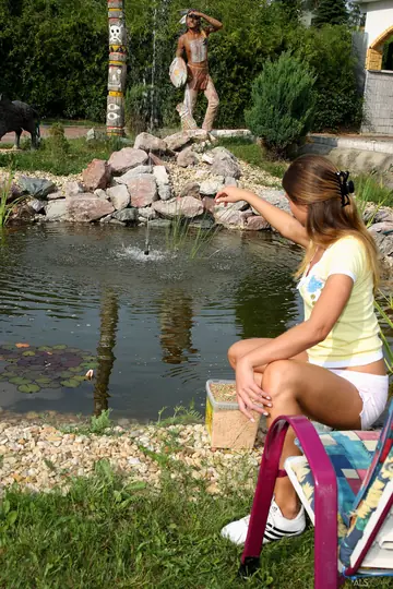 Tall European Brunette Touches Herself in Shorts and Spreads Her Legs