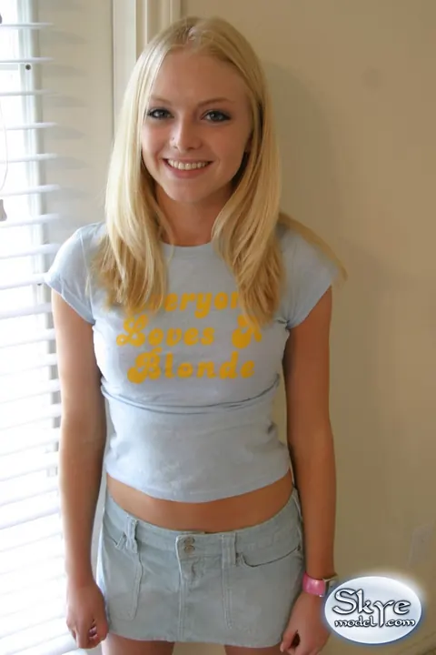Skye Model: Blonde with Small Natural Tits and a Piercing Poses in a Skirt – photo 8 of 12