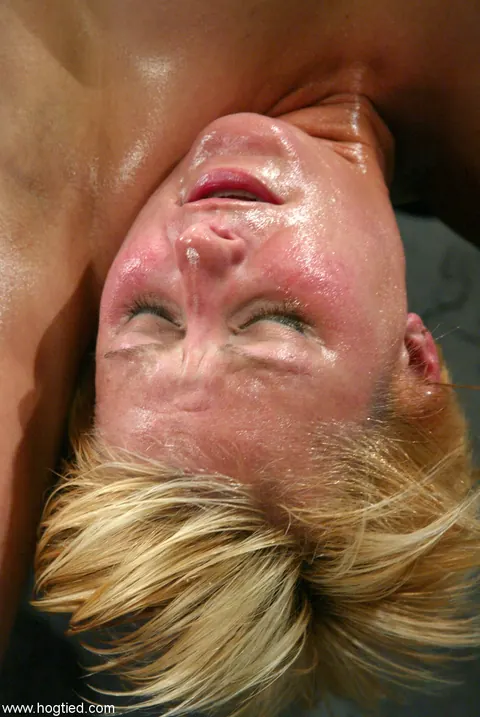 Short-Haired Blonde in Bondage Sucks Cock While Restrained – photo 13 of 21