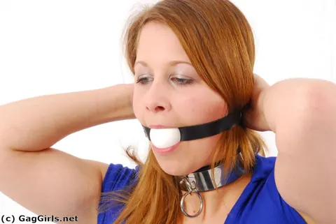 Redhead in Jeans and High Heels Ball-Gagged and Grasping Ankles – photo 11 of 16