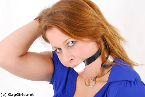 Redhead in Jeans and High Heels Ball-Gagged and Grasping Ankles – photo 8 of 16