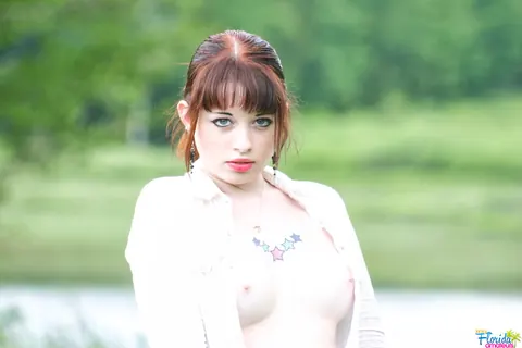 Busty Redhead Amateur Exposes Her Tits in a Forest – photo 8 of 12