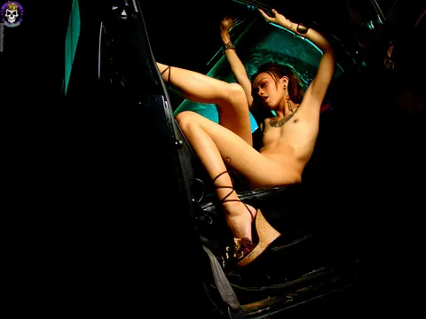 Rae Malaya: Slim Asian MILF in a Skirt and Heels Strips Nude in a Car – photo 16 of 16