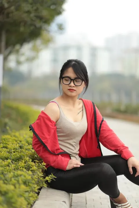 Asian Brunette in Glasses Poses Outdoors – photo 15 of 21