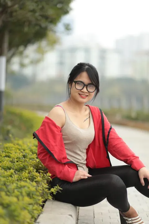 Asian Brunette in Glasses Poses Outdoors – photo 14 of 21