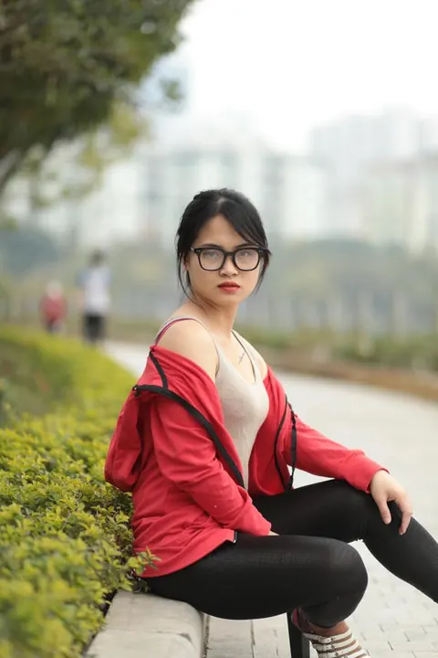 Asian Brunette in Glasses Poses Outdoors – photo 16 of 21