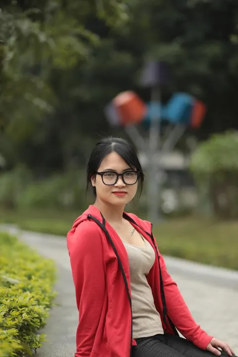 Asian Brunette in Glasses Poses Outdoors – photo 8 of 21