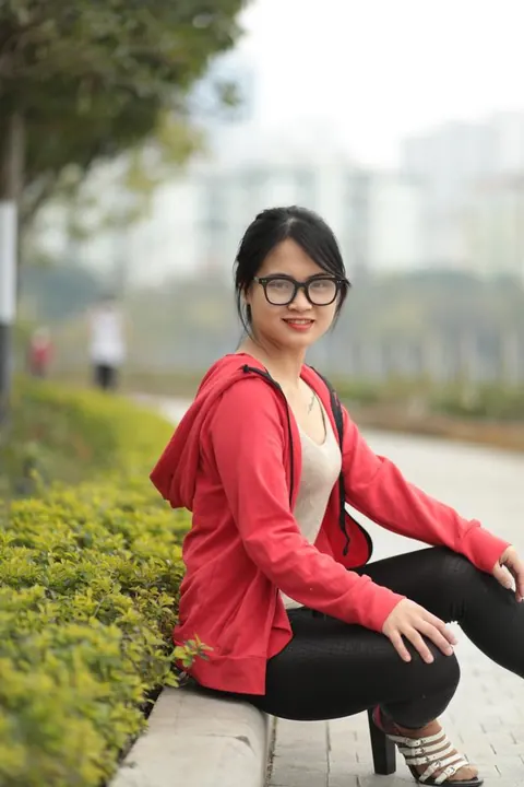 Asian Brunette in Glasses Poses Outdoors – photo 17 of 21