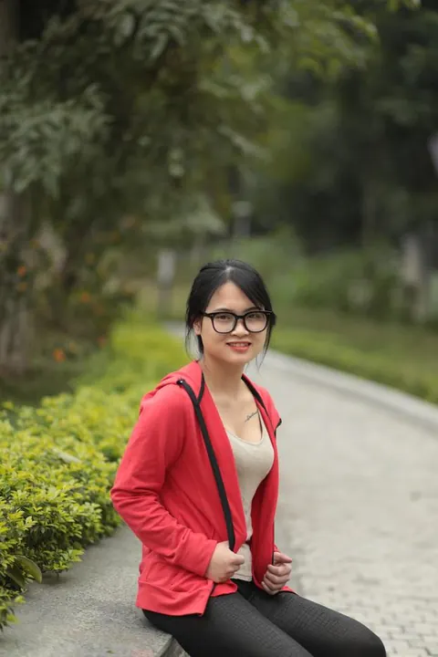 Asian Brunette in Glasses Poses Outdoors – photo 5 of 21