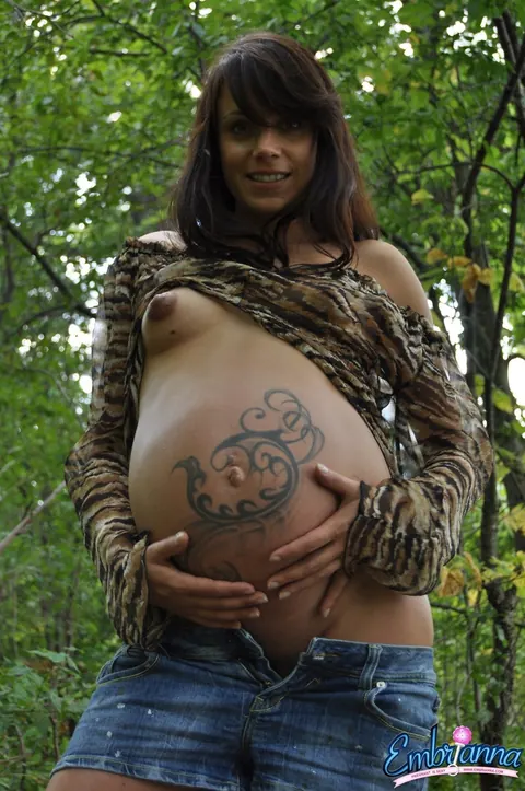 Pregnant Brunette Strips Out of Her Shorts in the Woods – photo 8 of 16