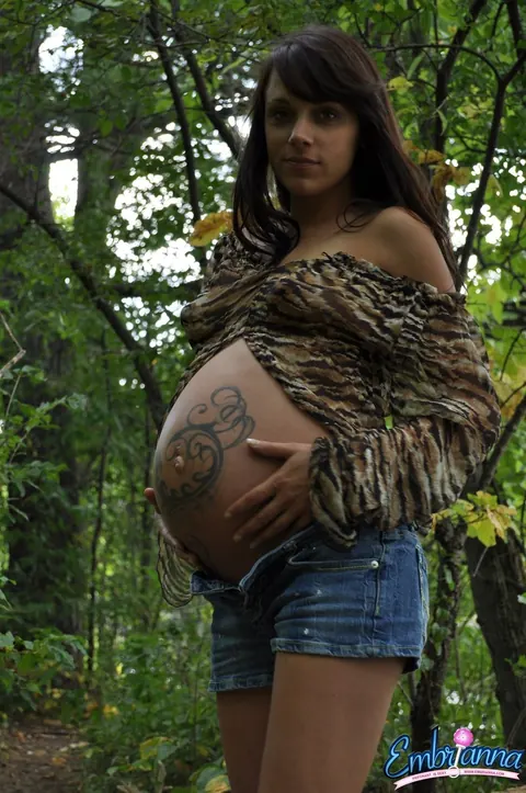 Pregnant Brunette Strips Out of Her Shorts in the Woods – photo 3 of 16