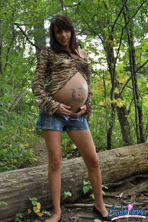 Pregnant Brunette Strips Out of Her Shorts in the Woods – photo 4 of 16