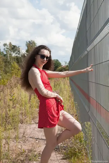 Brunette Strips Out of Her Red Dress and Spreads Outdoors