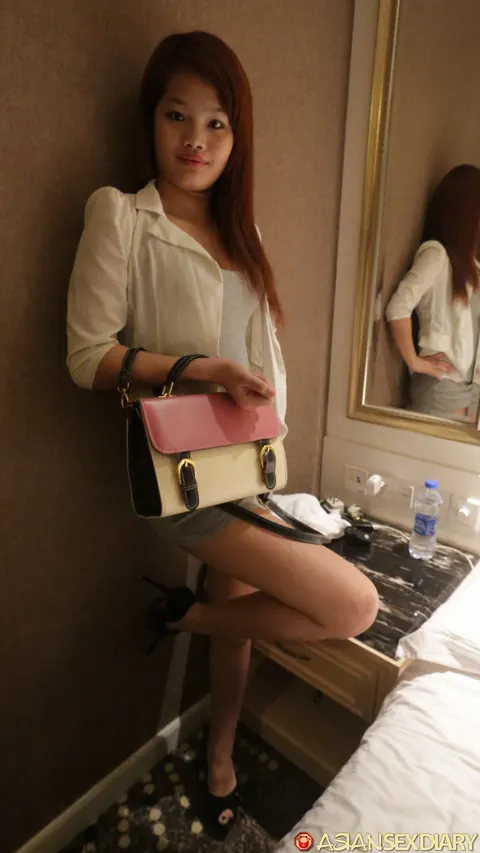 Asian Redhead in Lingerie Skirt and Heels Flashes Her Figure – photo 8 of 21