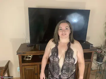 Mature BBW with Big Tits Uses a Dildo in Lingerie