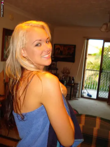 Tall Blonde Removes Her Robe and Spreads Her Legs
