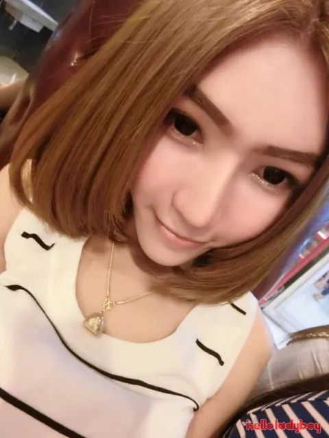 Asian Trans Woman in Lingerie Strips Nude and Poses on Her Side – photo 10 of 16
