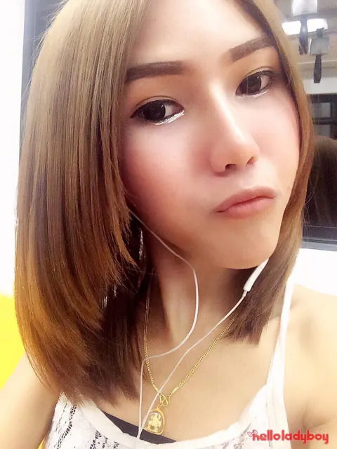 Asian Trans Woman in Lingerie Strips Nude and Poses on Her Side – photo 11 of 16